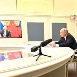 Председатель Китайской Народной Республики СИ Цзиньпин и президент России Владимир ПУТИН провели видеовстречу. Фото пресс-службы главы государства